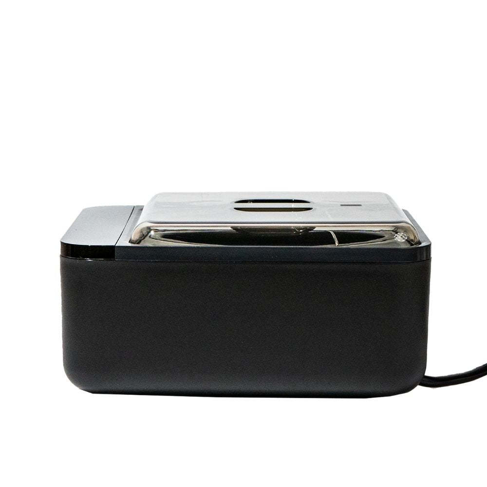 Wax warmer against a white background side on view